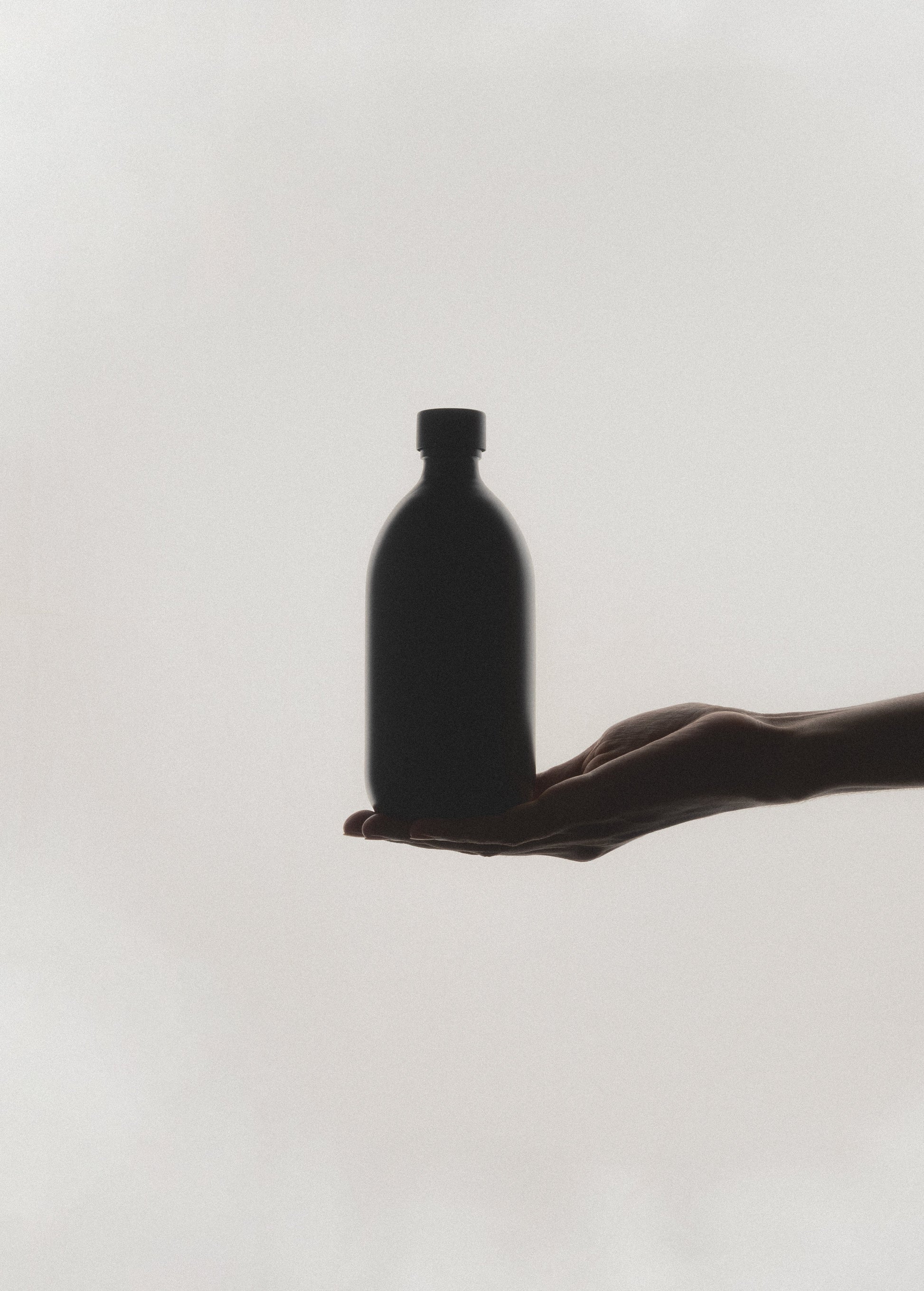 Black Glass Storage Bottle and Cap - REGN