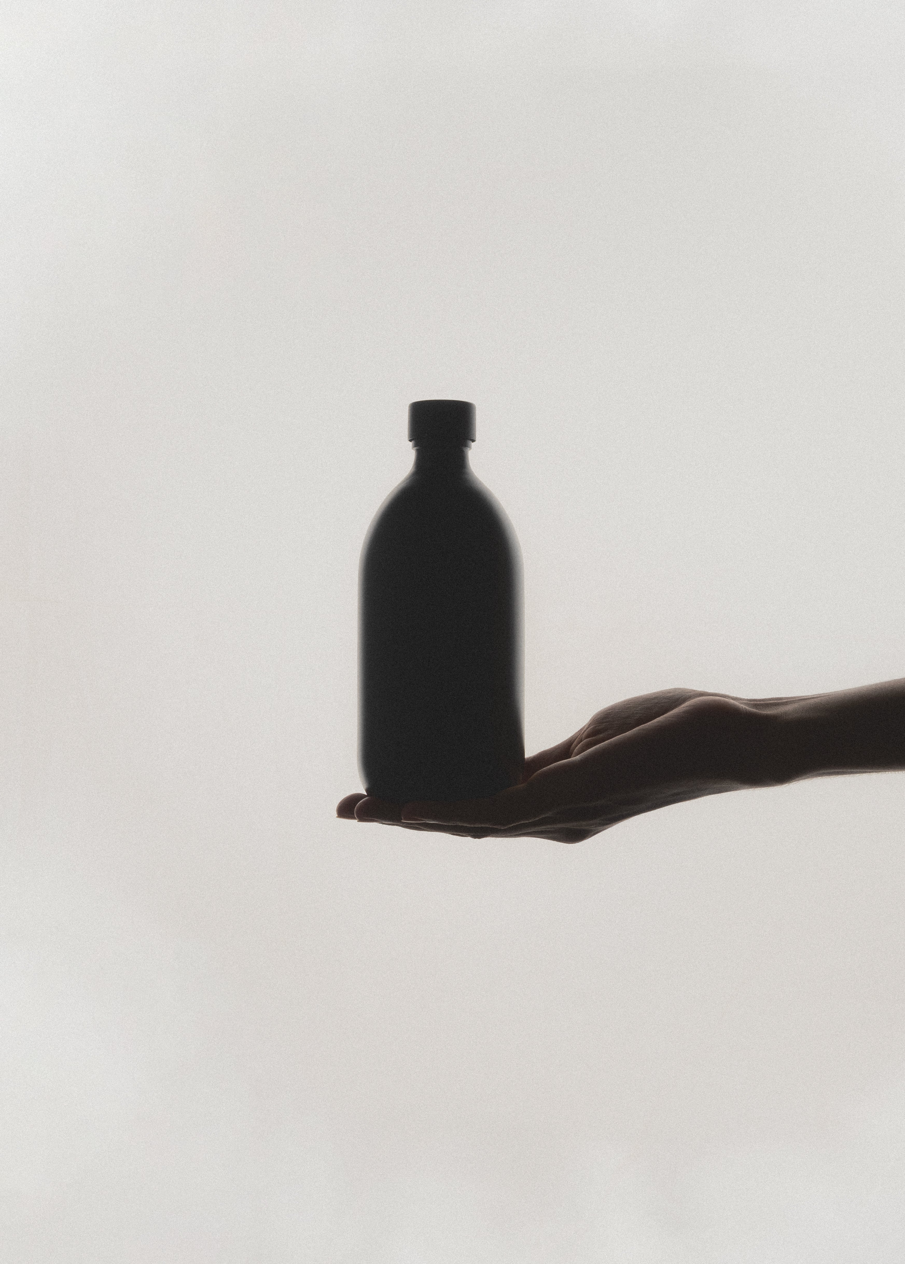 Black Glass Storage Bottle and Cap - REGN