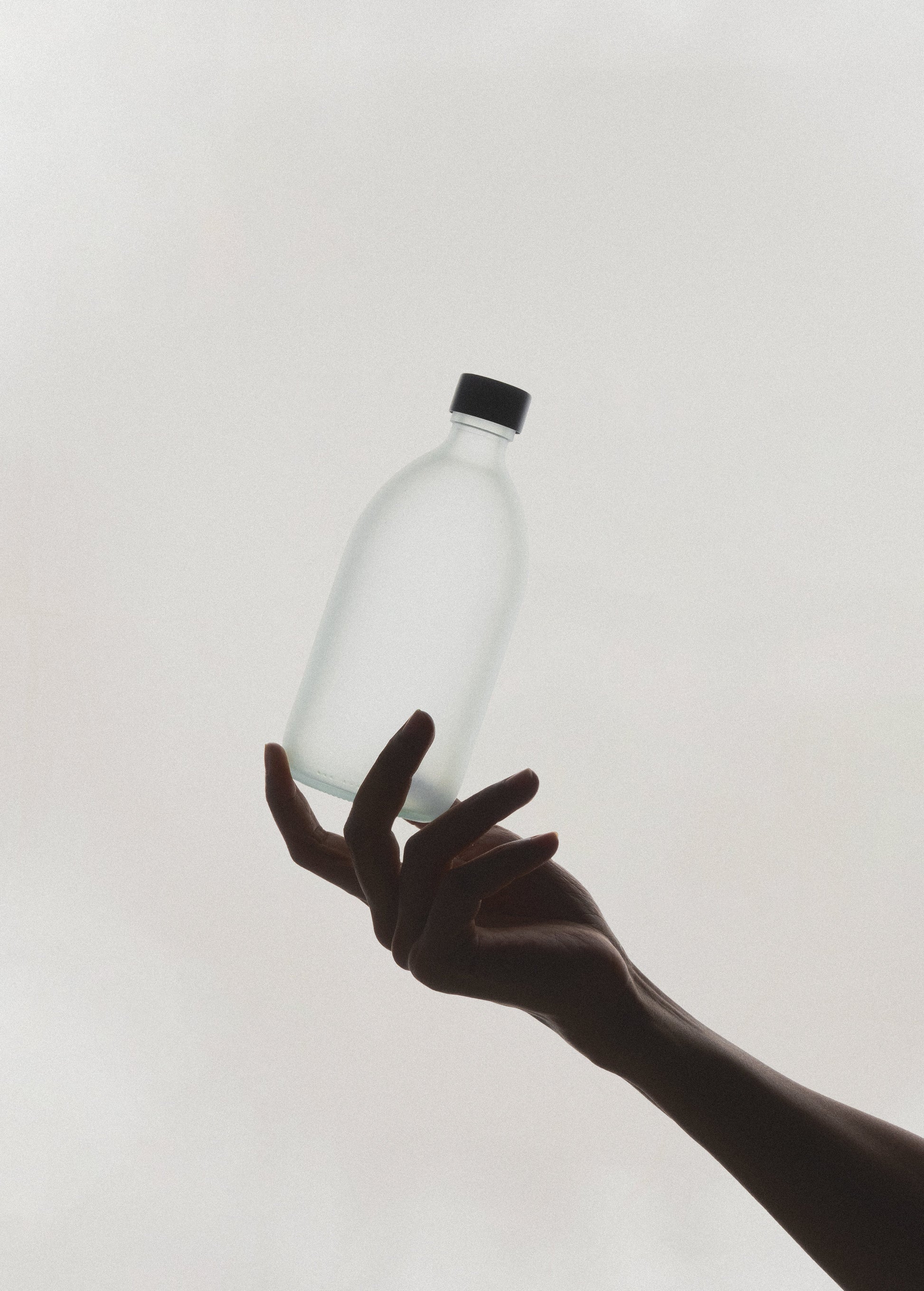 White Glass Bottle and Cap - REGN