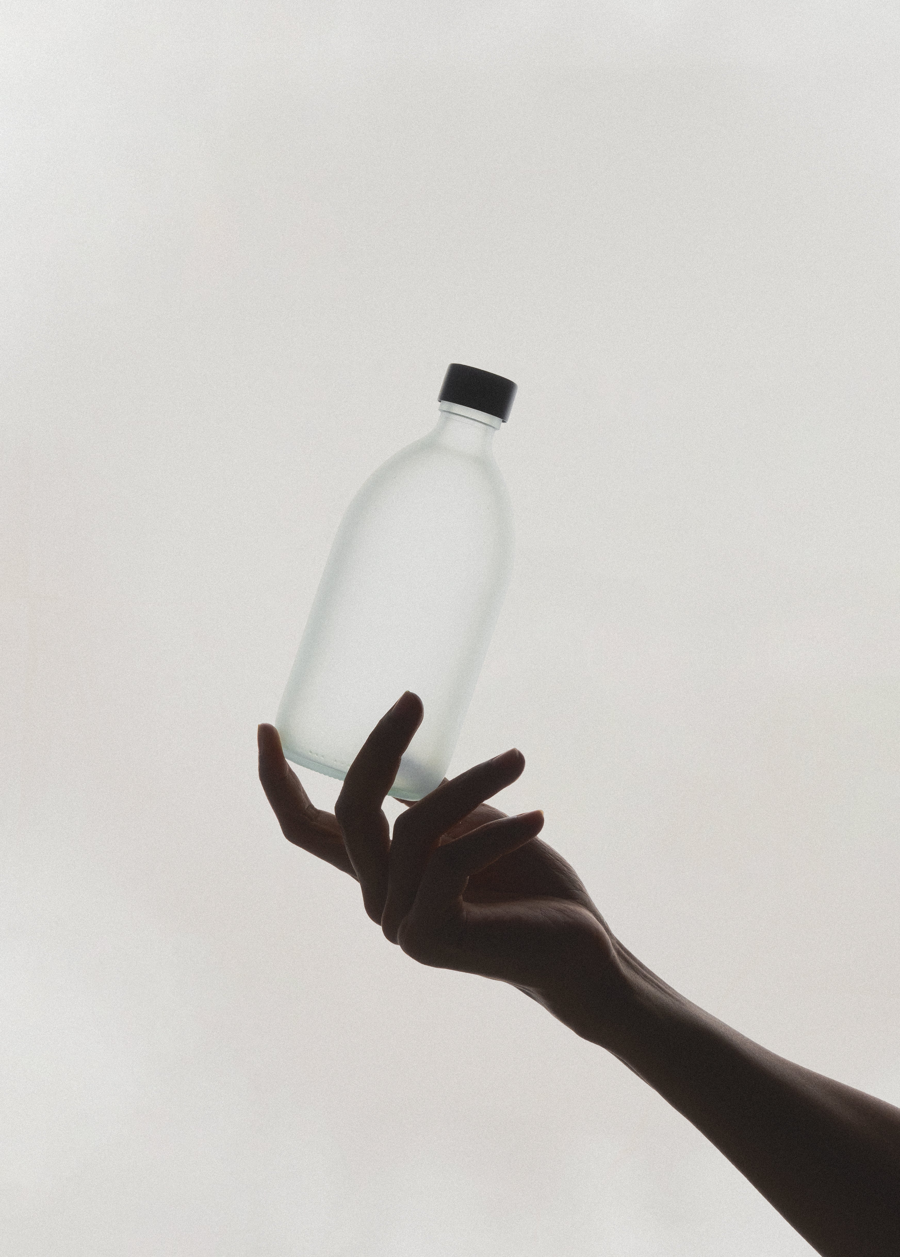 White Glass Bottle and Cap - REGN