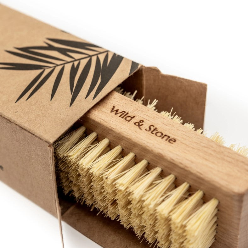BIODEGRADABLE NATURAL BRISTLE NAIL BRUSH coming out of the box
